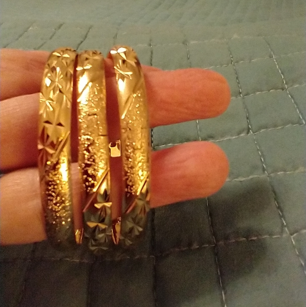 Gold over brass bracelet bangles never worn in package.
